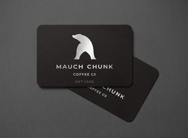 Black gift card with white bear logo and text on a dark gray background